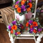 Vibrant wedding bouquets. Purple and orange